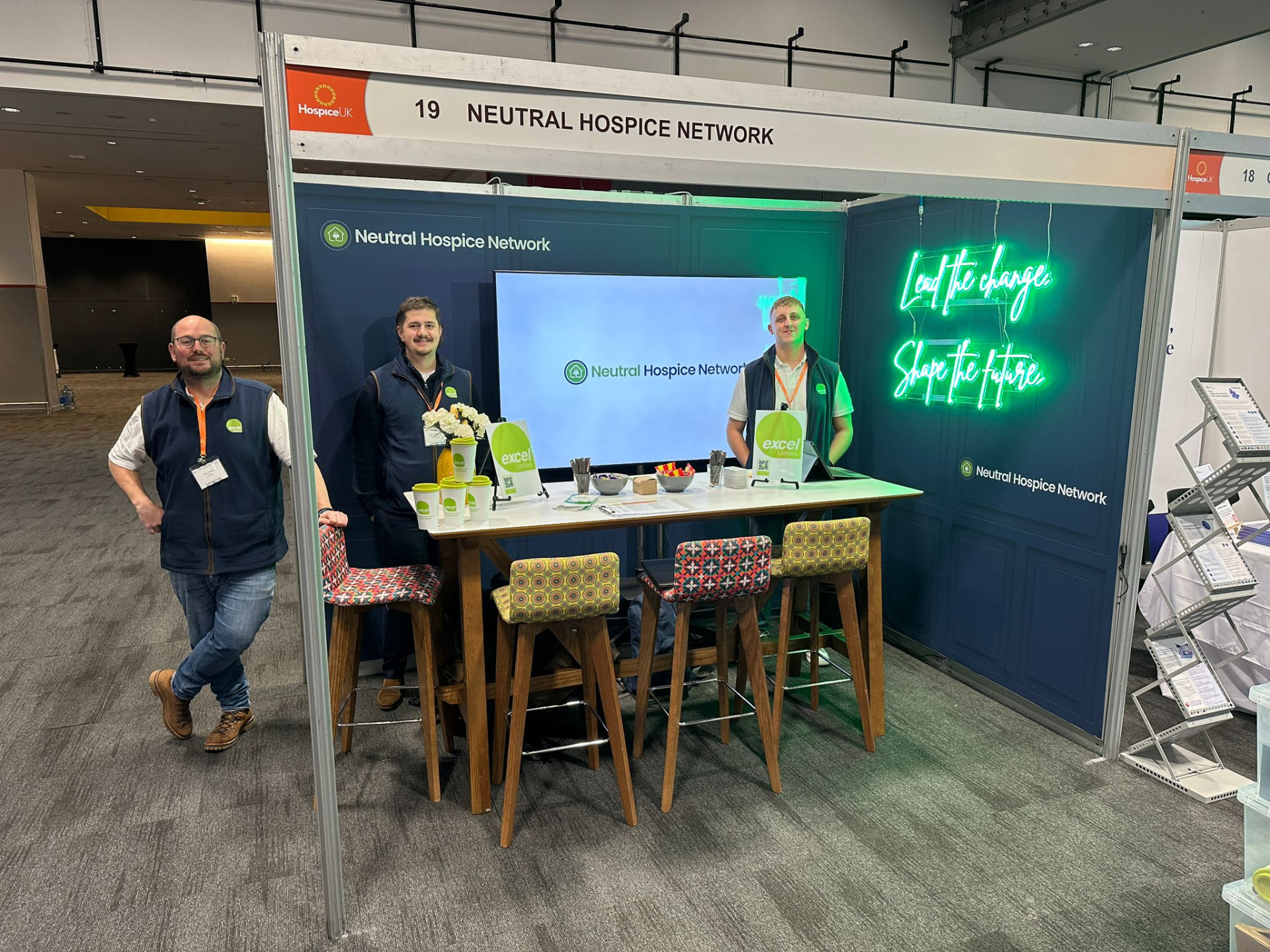 Excel Utilities team on the Neutral Hospice Network stand at an industry event